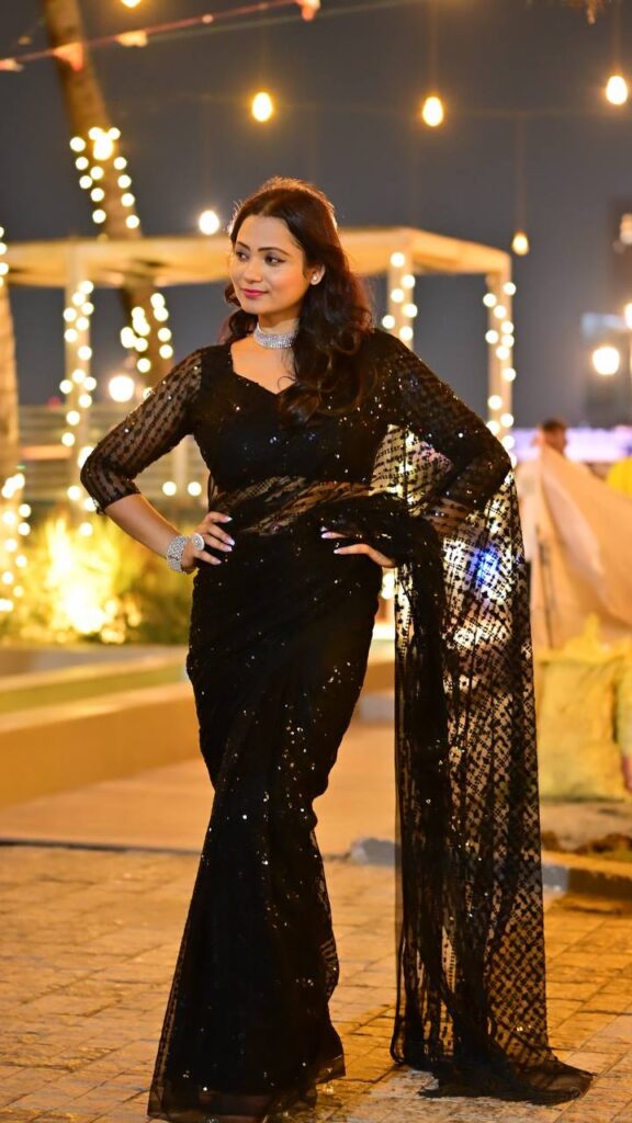 Black pre-draped shimmer saree for night wedding